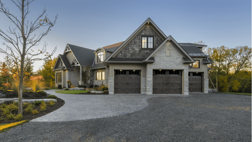Image of a home with three separate garage doors.
